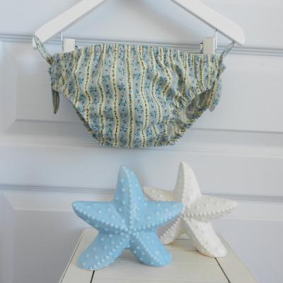 Maillot de bain fillette en coton jaune et bleu motif roses bleues, nœuds sur les côtés - 6 ans